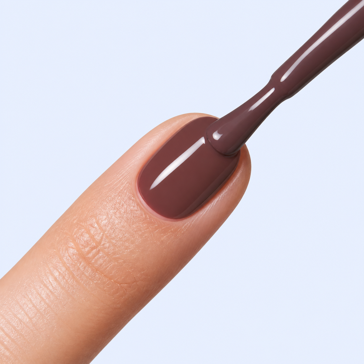Aplicação do Color Gel Rhapsody American Creator em unha castanho malva escuro