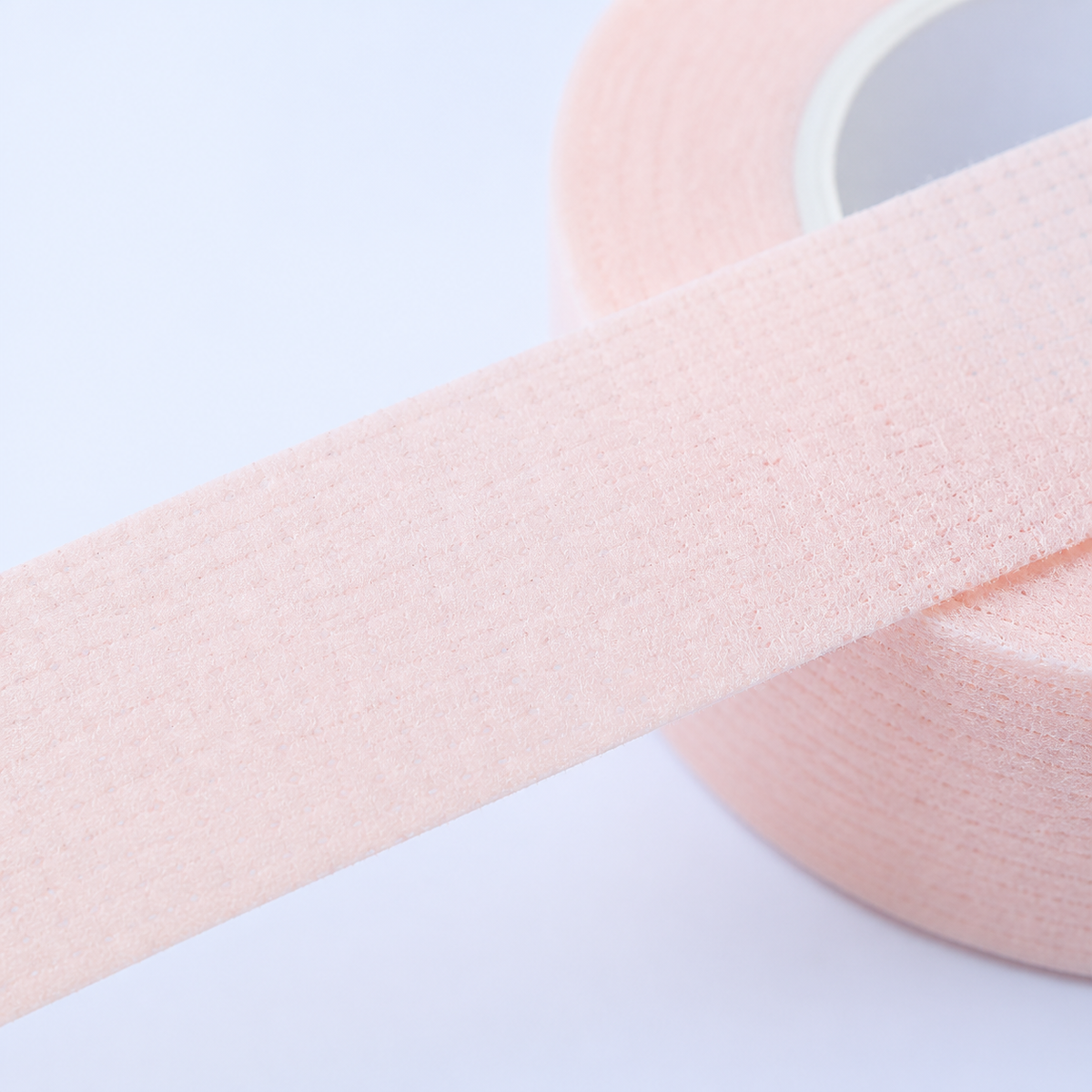 Textura da fita adesiva em papel respirável microperfurado
