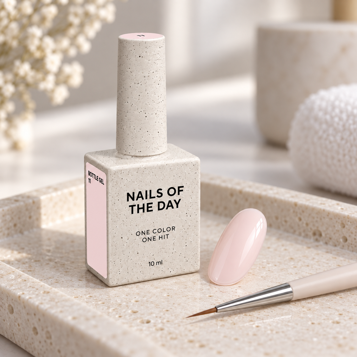 Bottle Gel 11 Nails Of The Day apresentado num ambiente profissional com amostra em tom nude rosa muito pálido
