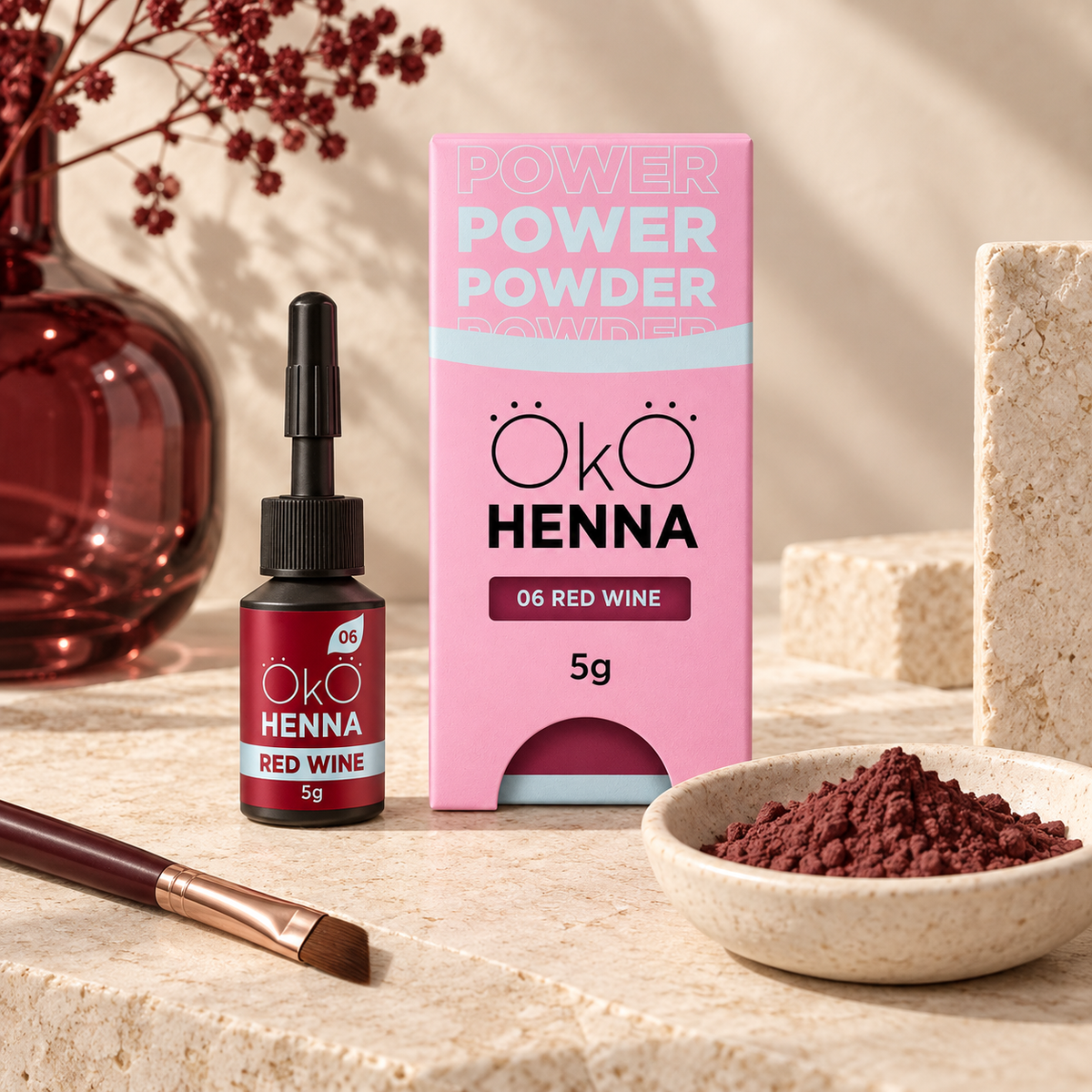 OKO Henna para Sobrancelhas 06 Red Wine — frasco e pó da cor apresentados num ambiente profissional